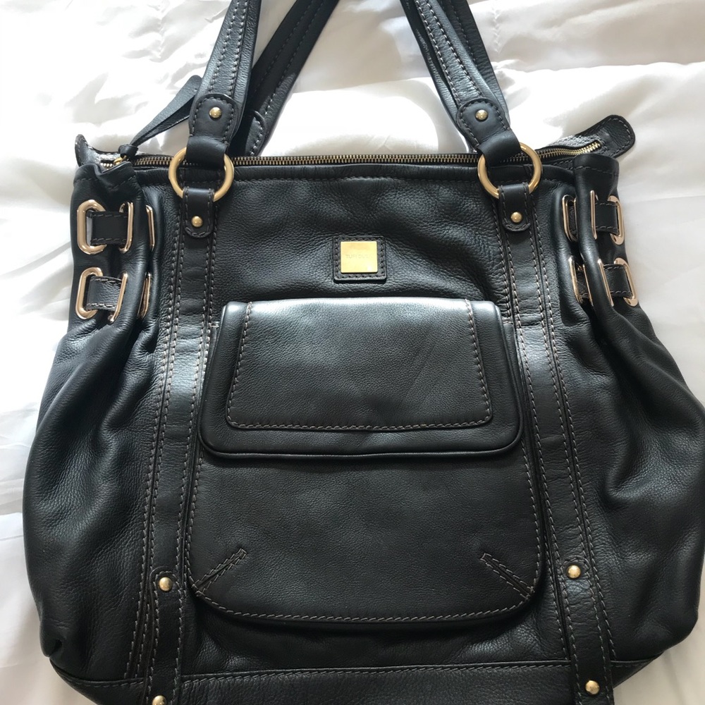 Gorgeous Tufi Duek black leather handbag