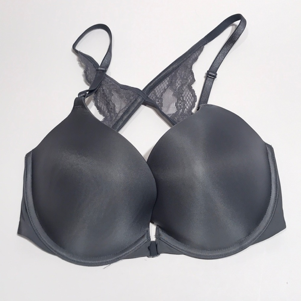Victoria’s Secret gray bra clasps in the front.