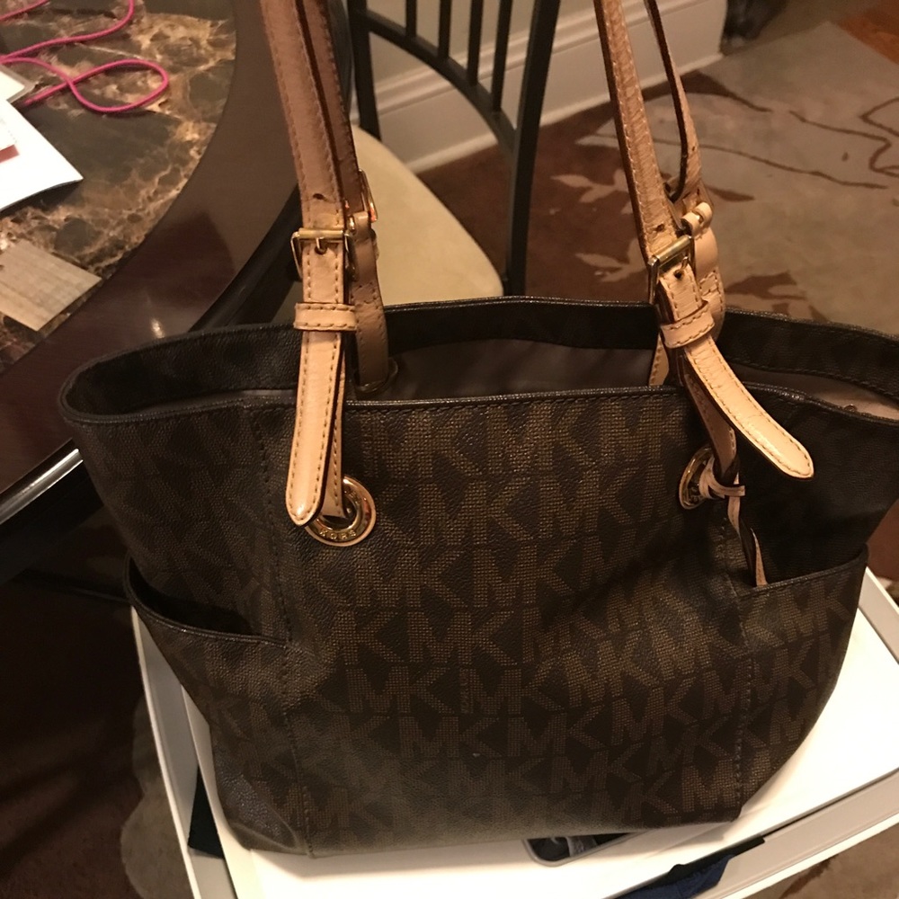 Brown and black Michael kors purse