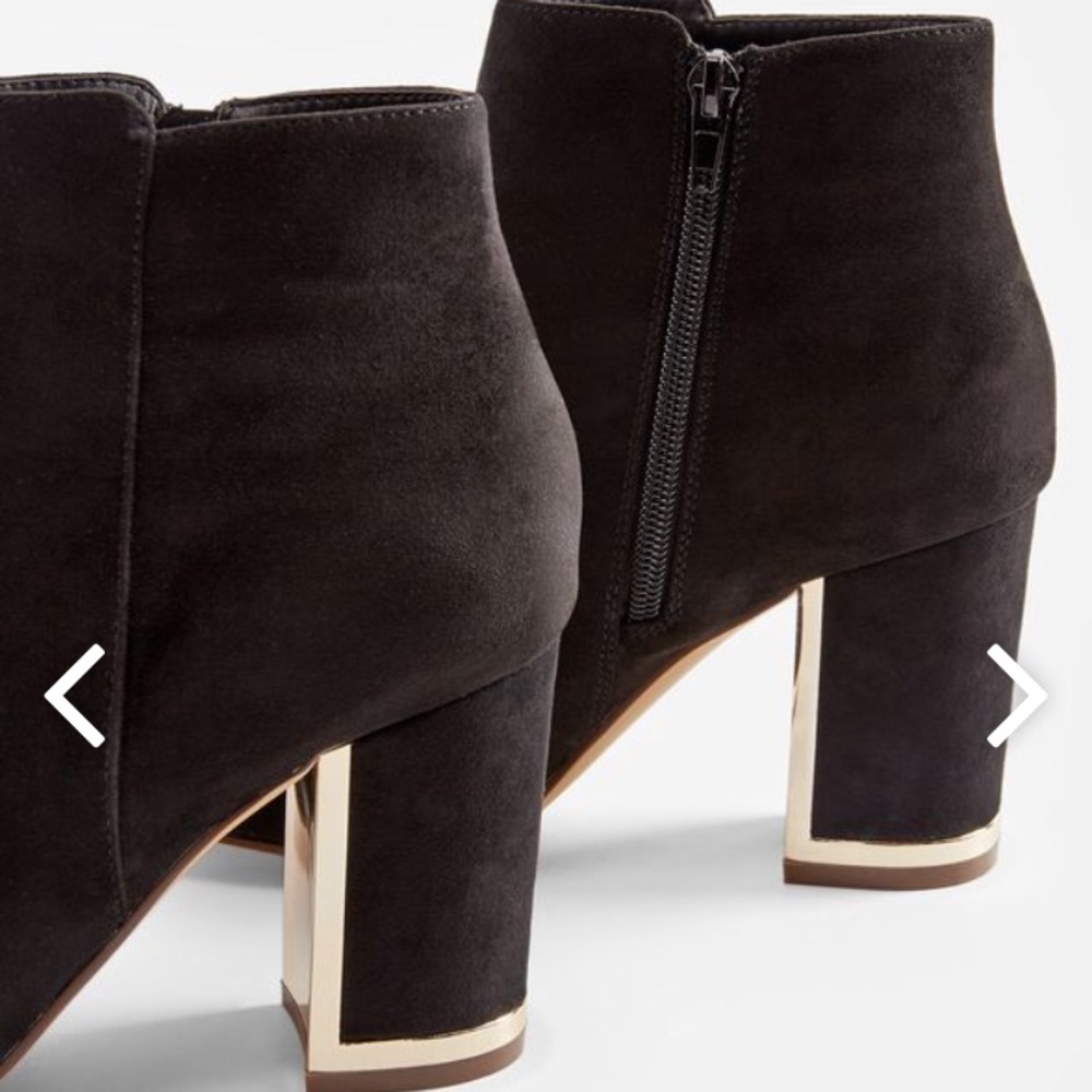 Black bootie with gold heel detail