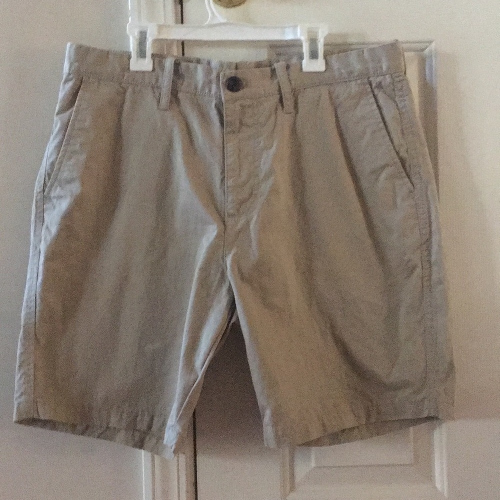 A pair of tan shorts.