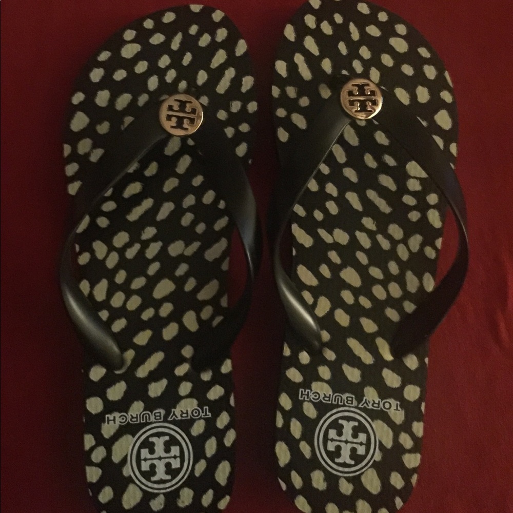 Tory Burch Flip Flops. Size 7. Never worn.