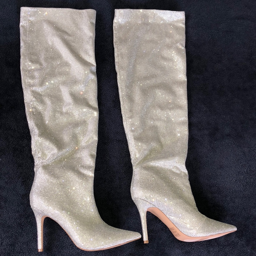 Aldo “Claira” sparkly high heel boot.