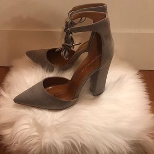 Gray suede heels.