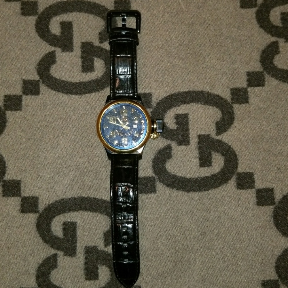 Black and Gold Invicta Watch