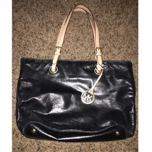 MK Black & tan leather purse