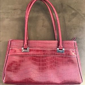 Crazy Horse a Liz Claiborne Company red handbag.