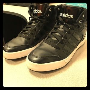 All black high top adidas