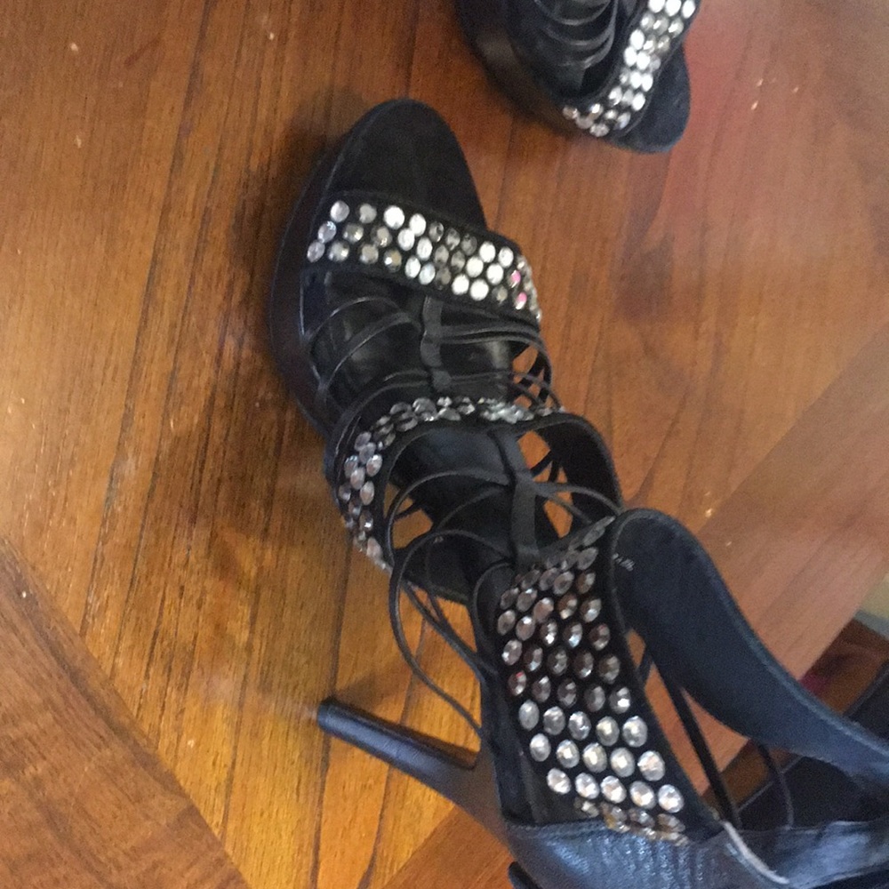 Black stilettos with embellishments.