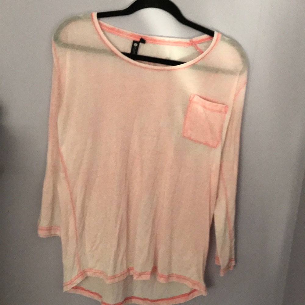 Three quarter length sleeve pale pink shirt
