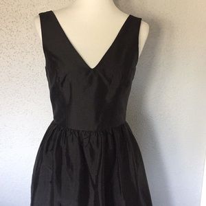 Black cocktail dress with pockets