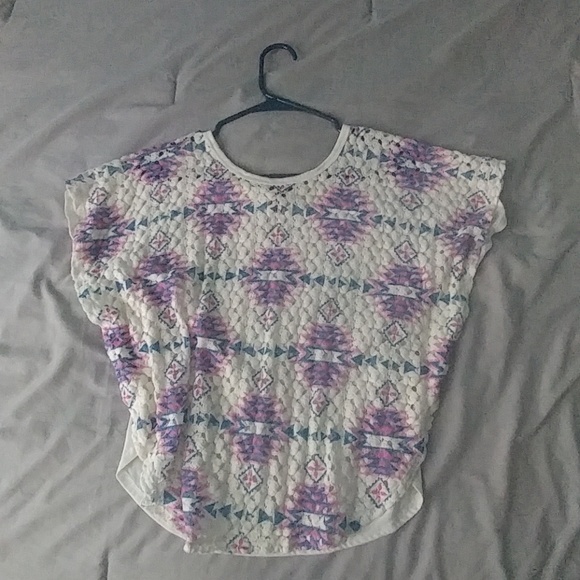 A shirt with colorful detailing on the front. - Picture 1 of 2