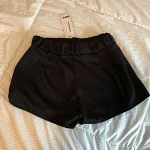 NWT black envelope skort