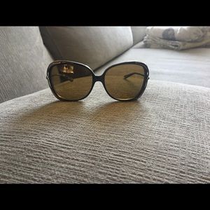 Brown Oakley polarized sunglasses