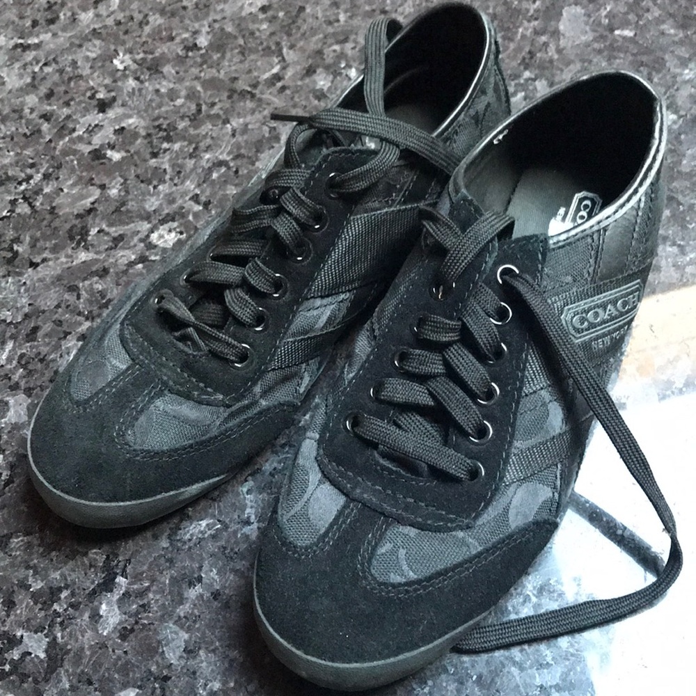 Coach signature print sneakers.
