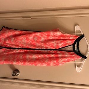 Pink and white dress.