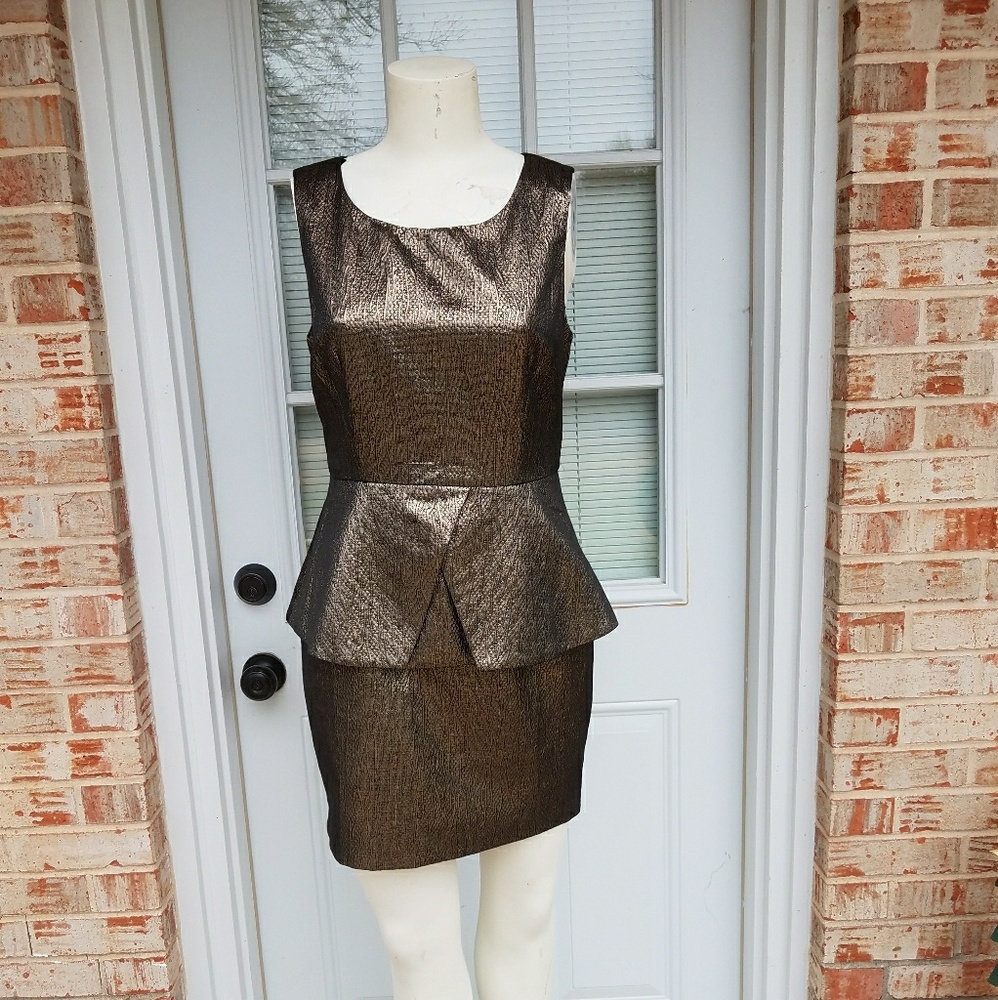 Beautiful new  peplum  Style gold dress