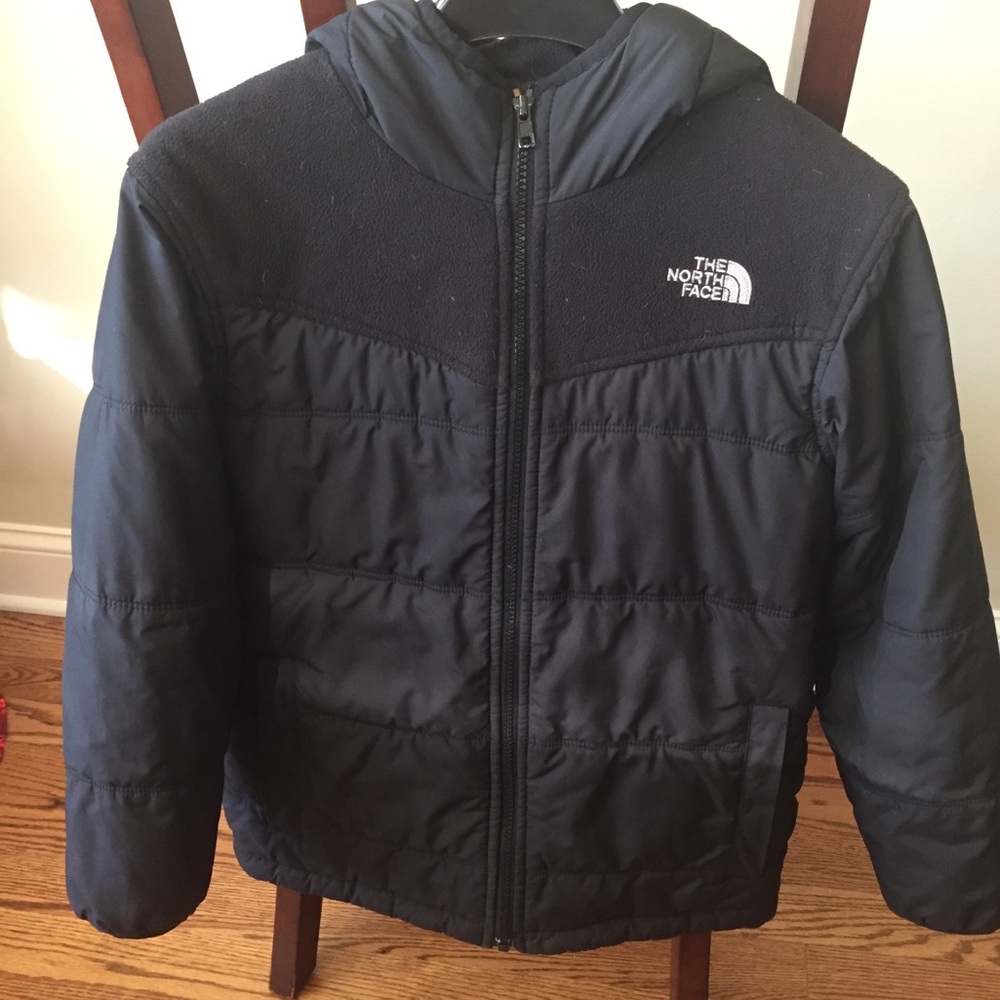 The North Face boy size M ( size 10-12).
