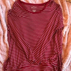 Red and white stripped v neck shirt