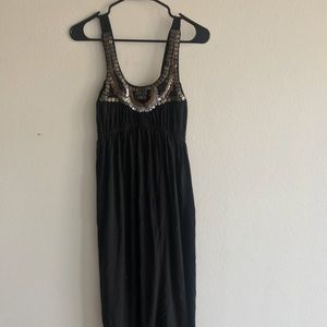 Black sequined maxi dress.