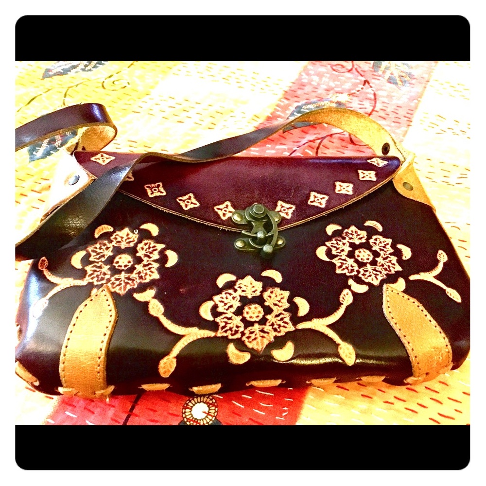 Small leather purse made in India. Hand stitched.