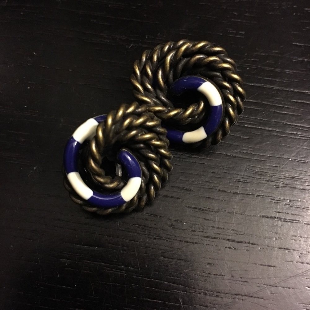 Nautical-style bronze clip on earrings.