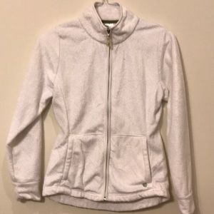 Dakini white fleece active wear top.