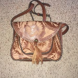 Flower-etched hand-bag with tassel-brand new!