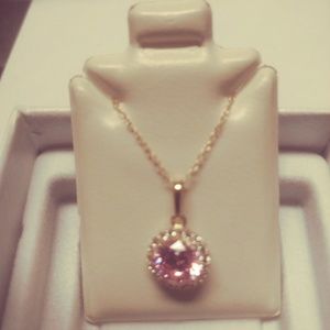 10k yellow gold pink topaz center new in box
