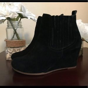Black wedge booties
