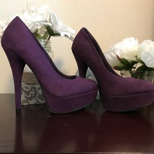 Purple platform pumps
