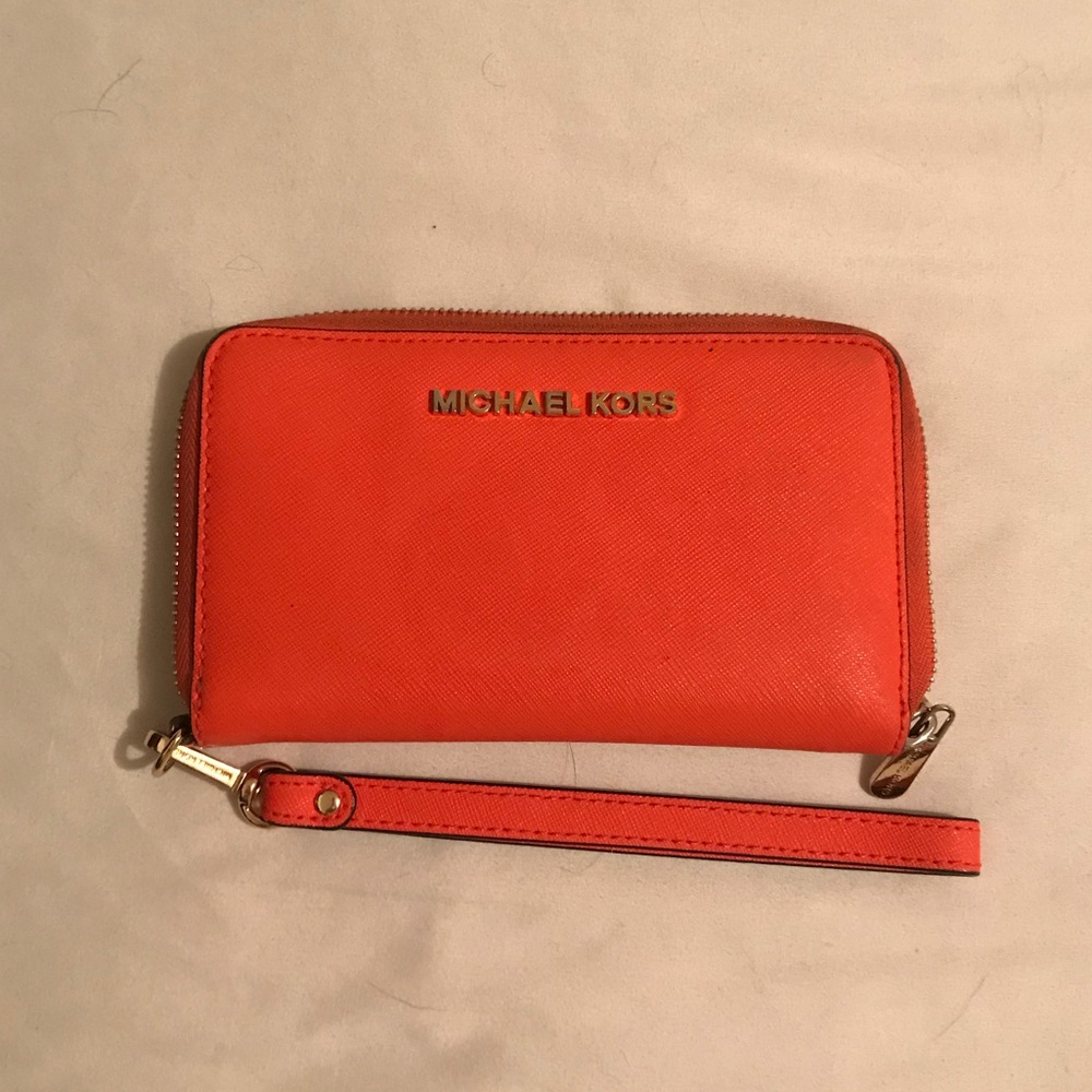 Micheal Kors’ Orange Wristlet