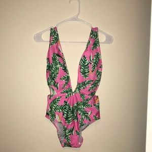 Adorable one piece bathing suit.Never been worn.