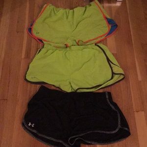 Three pairs under armour running shorts
