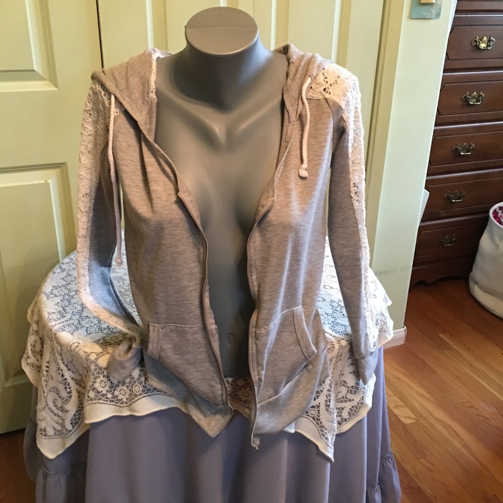 Gray jacket, white lace arms