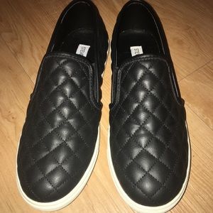 Brand new Steve Madden black slip ons