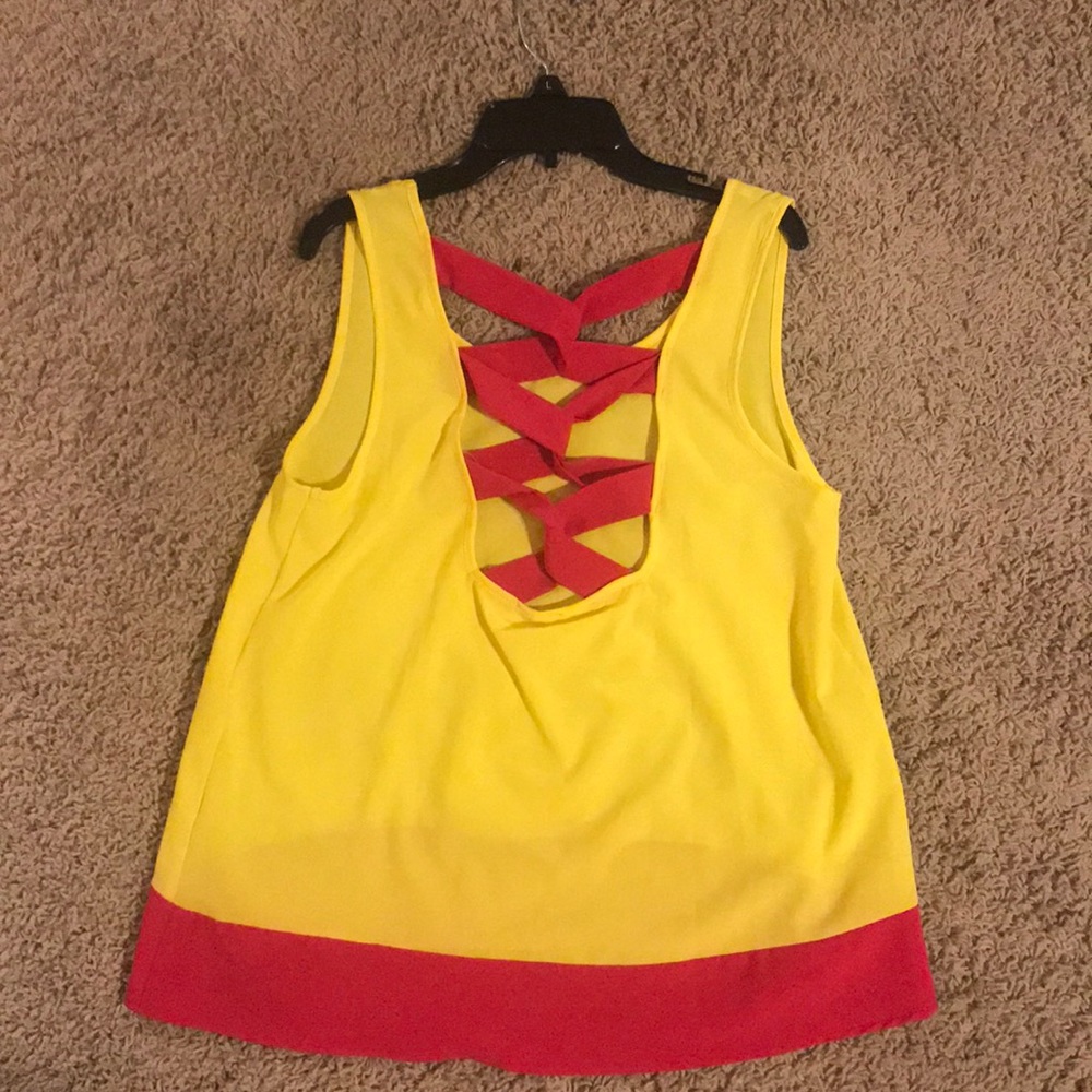 Yellow shirt with pink accents