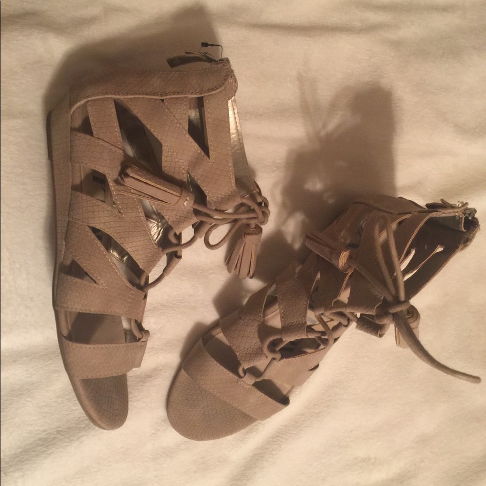 Barely stepped in sandals open to offers !