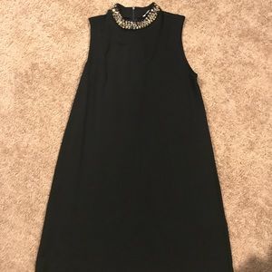 Little black dress with jewels neckline
