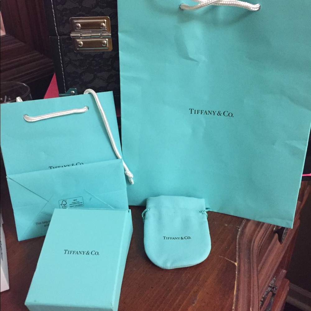 Various size Tiffany boxes, bags, and cleaning bag