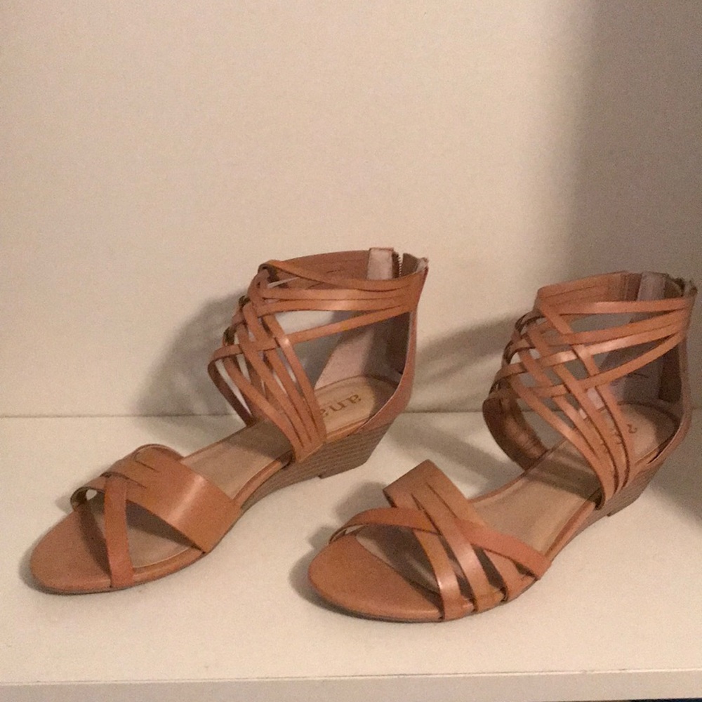 Tan sandals never worn.