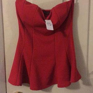 Strapless body central red top.