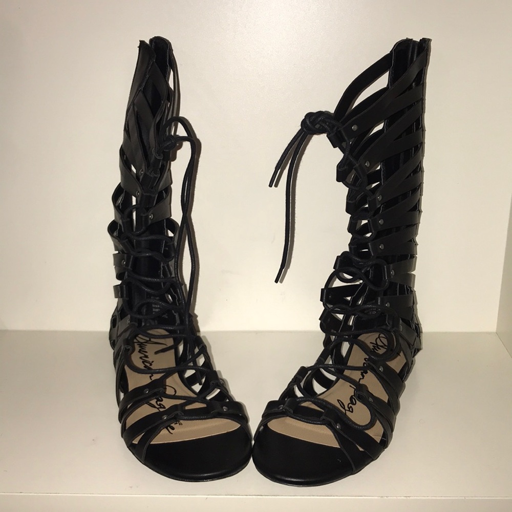 Black gladiator sandals.