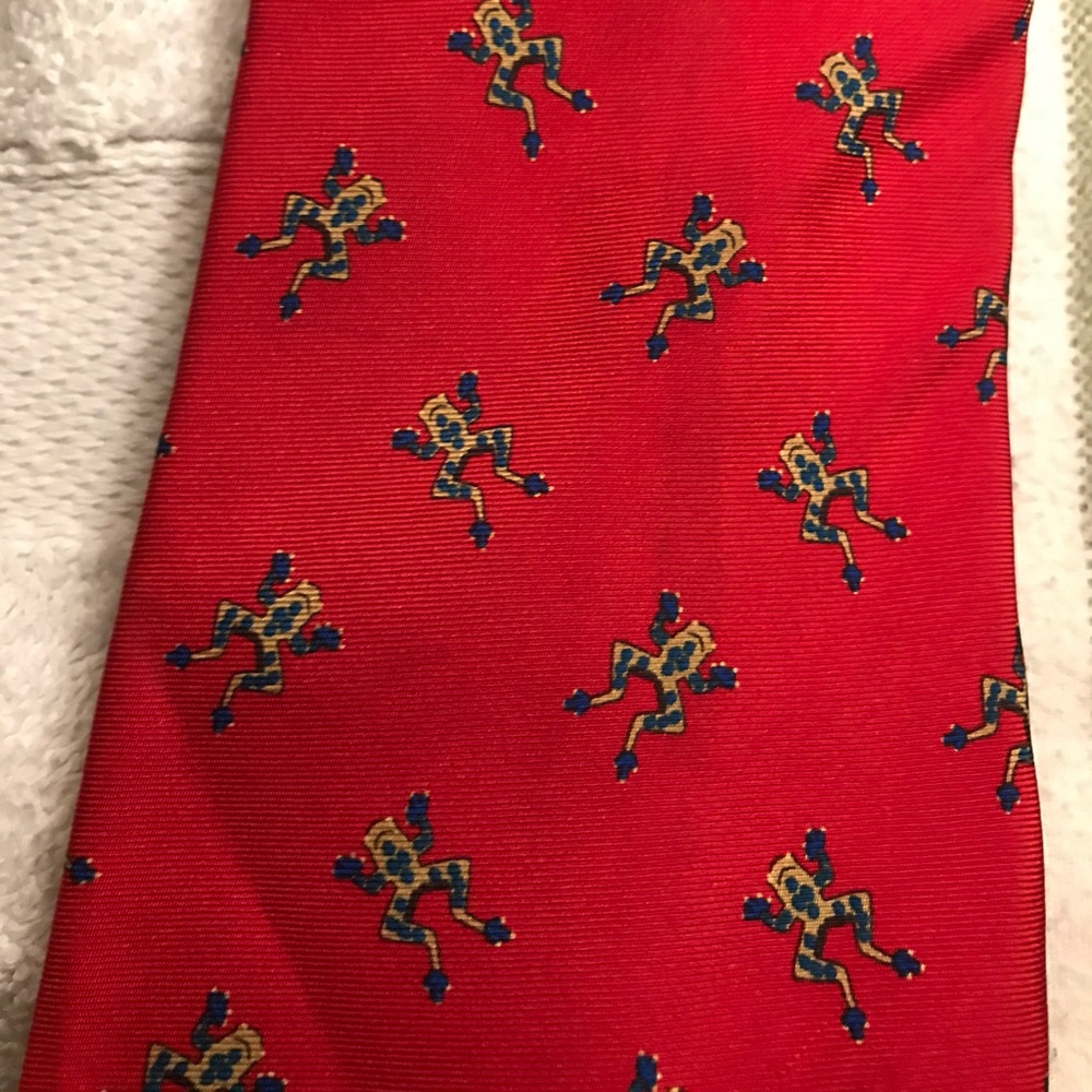 Louis dell olio tie red background with frogs.