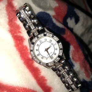 Women’s silver bulova watch. OBO