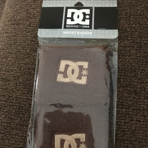 Brand new chocolate brown DC wristbands...2pk - Picture 1 of 1