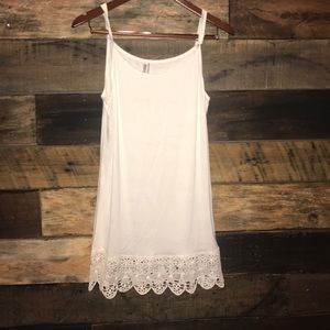 Cream slip dress or undershirt with lace at bottom