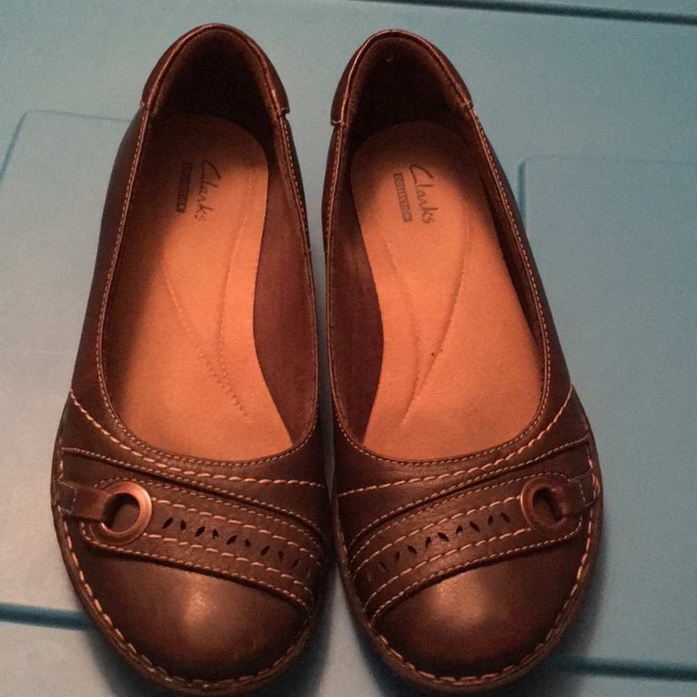 Clarks brown slip on flats