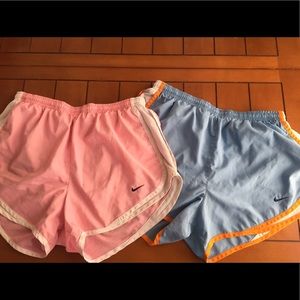2 pairs Nike tempo track shorts.