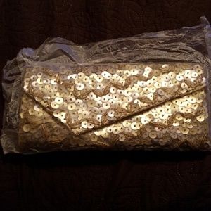 Gold hand clutch
